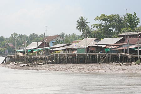 Houses along the River Maenam Mae Klong in Samut Songkhram province